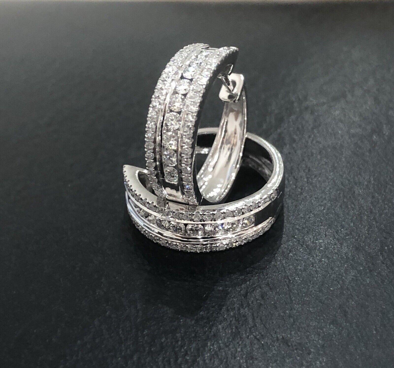 

Very elegant 18ct White gold diamond hoop Huggies earrings - hallmarked 750

0.65ct in full pair

VS & G/H - superior quality stones

Exceptionally clear diamonds and unmistakable sparkle

Over 5gram Very solid made

New with tags

Retail value