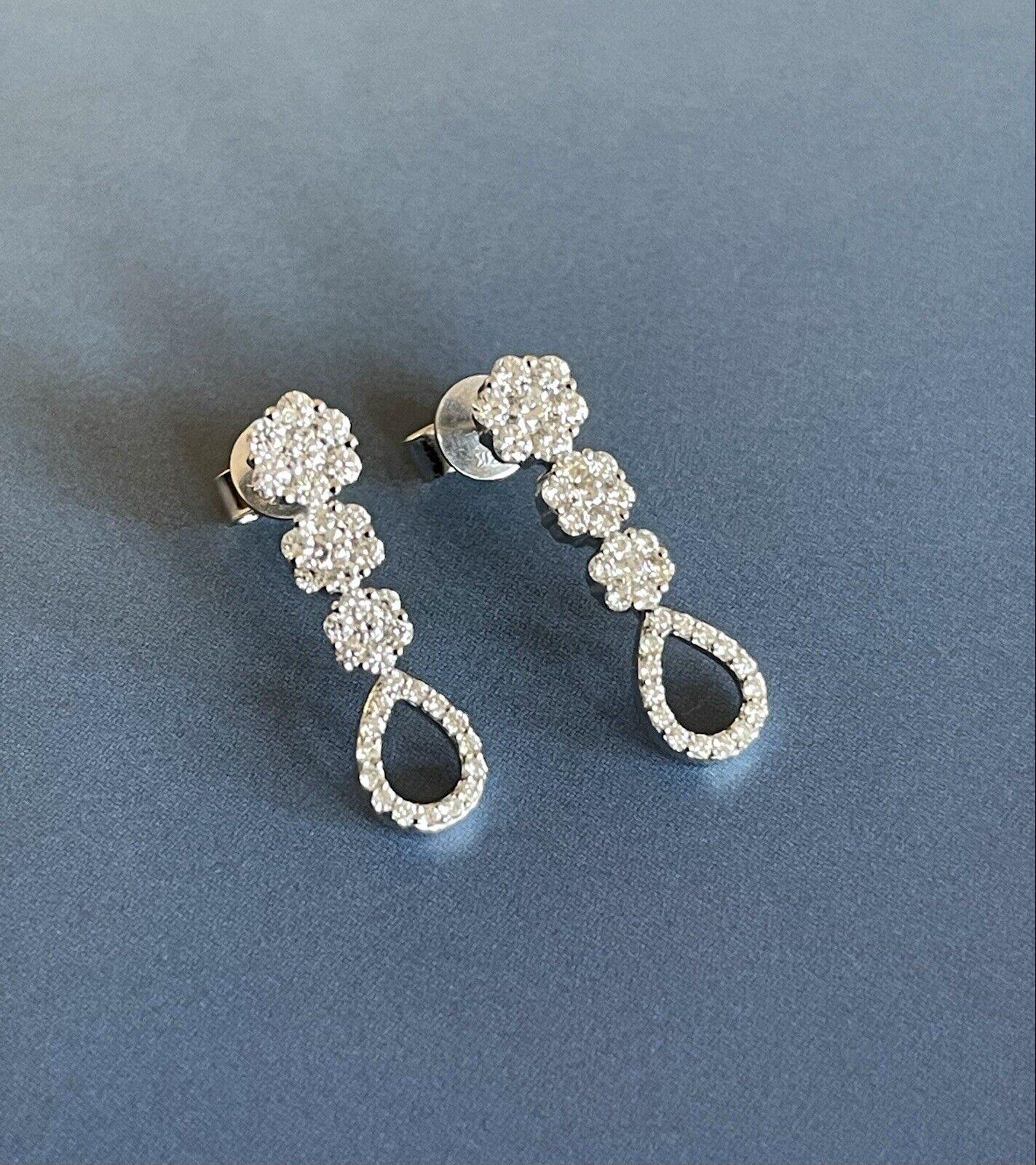 Earrings are the most sought after piece of jewellery as it adds sparkle to your face.

Modern chic meets High fine jewellery in this piece

It can make a great cocktail outfit piece or bridal

Matching Daisy 1ct necklace is also listed

Sparkling