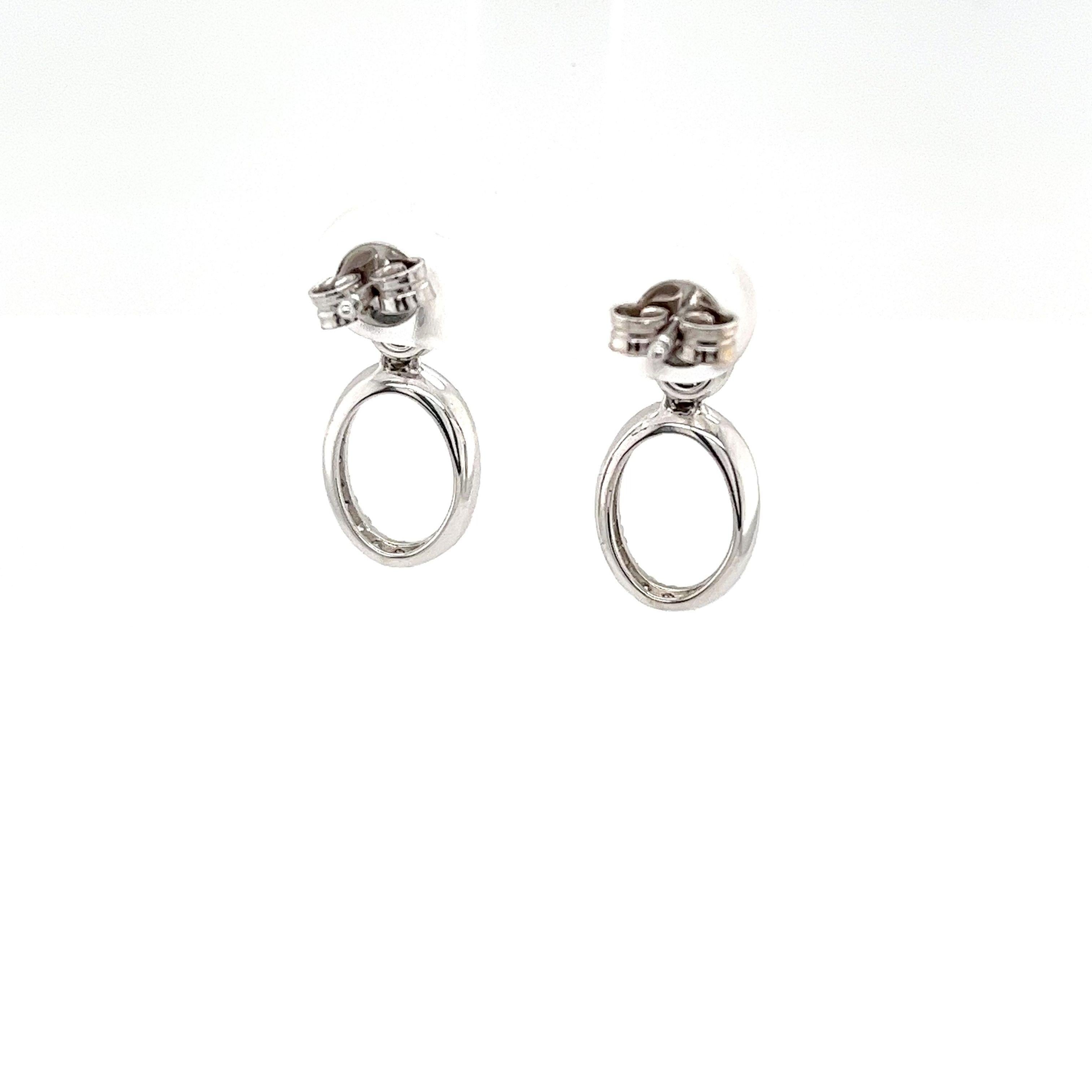 This pair of diamond earrings 
features a total of 0.35ct of round brilliant cut diamonds 
set in 18ct white gold. 
It's perfect for everyday and can be worn with any outfit.
Total Diamond Weight: 0.35ct
Diamond Colour: H
Diamond Clarity: SI1
Total