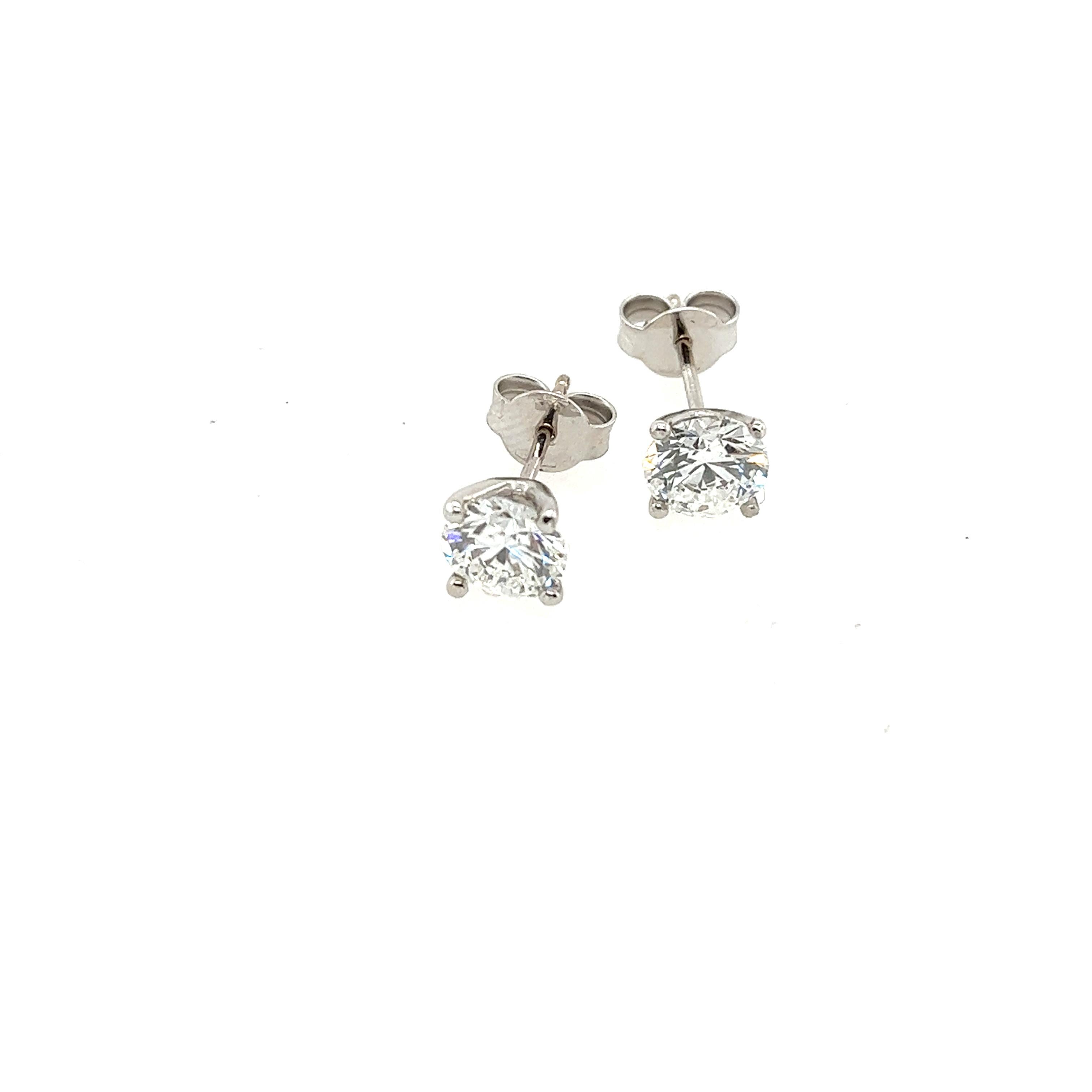 This pair of diamond stud earrings 
features a total of 2.04ct of round brilliant cut diamonds laboratory created, set in 18ct white gold. 
It's perfect for every day and can be worn with any outfit.
Total Diamond Weight: 2.04ct
Diamond Colour:
