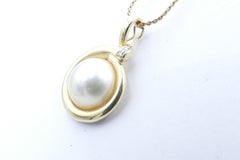 18ct White Gold Diamond Encrusted Pearl Pendant Necklace