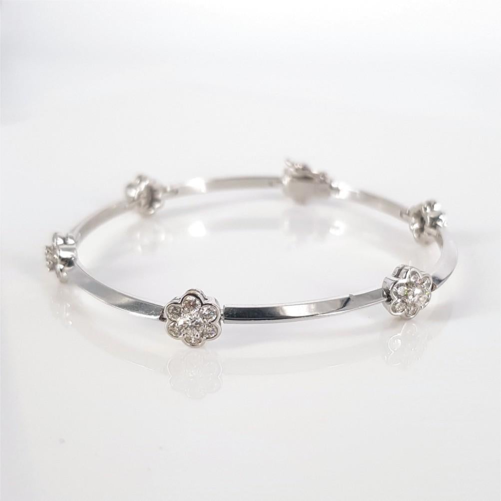 Modern 18ct White Gold Diamond Flower Bracelet For Sale