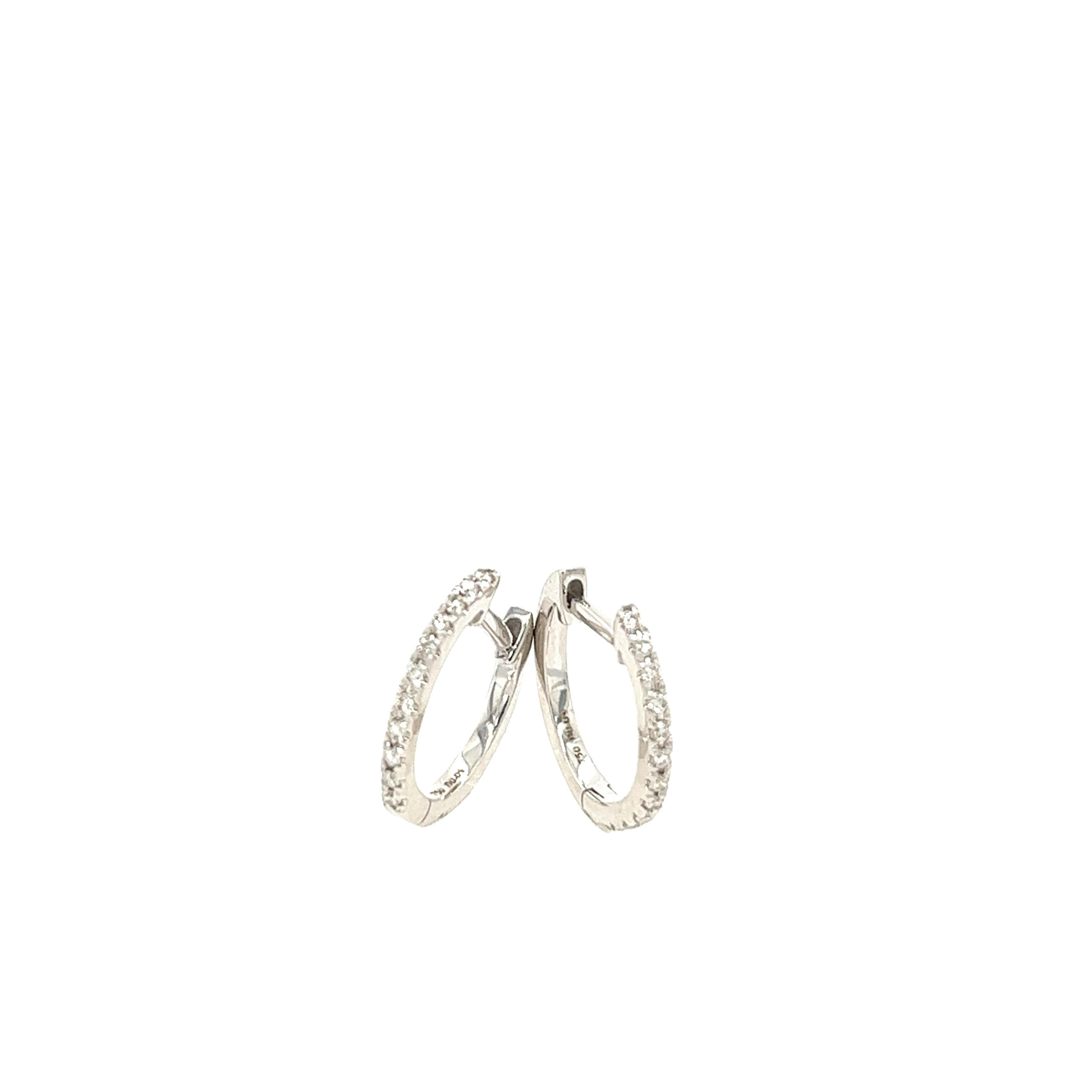 
These earrings measure 11mm in diameter and are set with 0.09ct of round diamonds. They are a great choice for women who love to wear jewellery that is both classy and elegant. These earrings are a perfect choice for any occasion.

Total Diamond