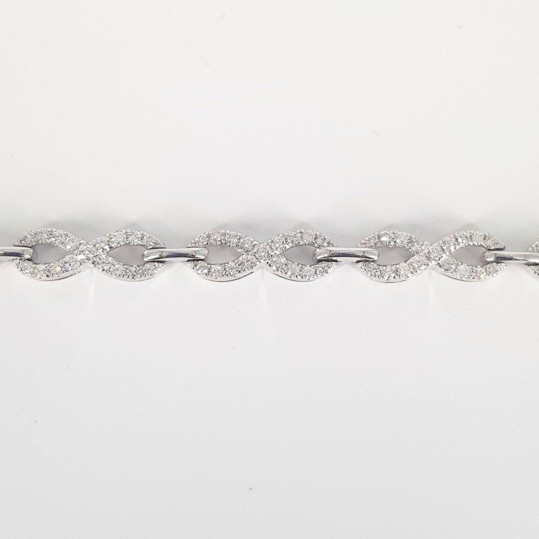 Round Cut 18ct White Gold Diamond Infinity Bracelet For Sale