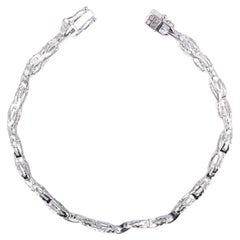 Bracelet infini en or blanc 18 carats avec diamants