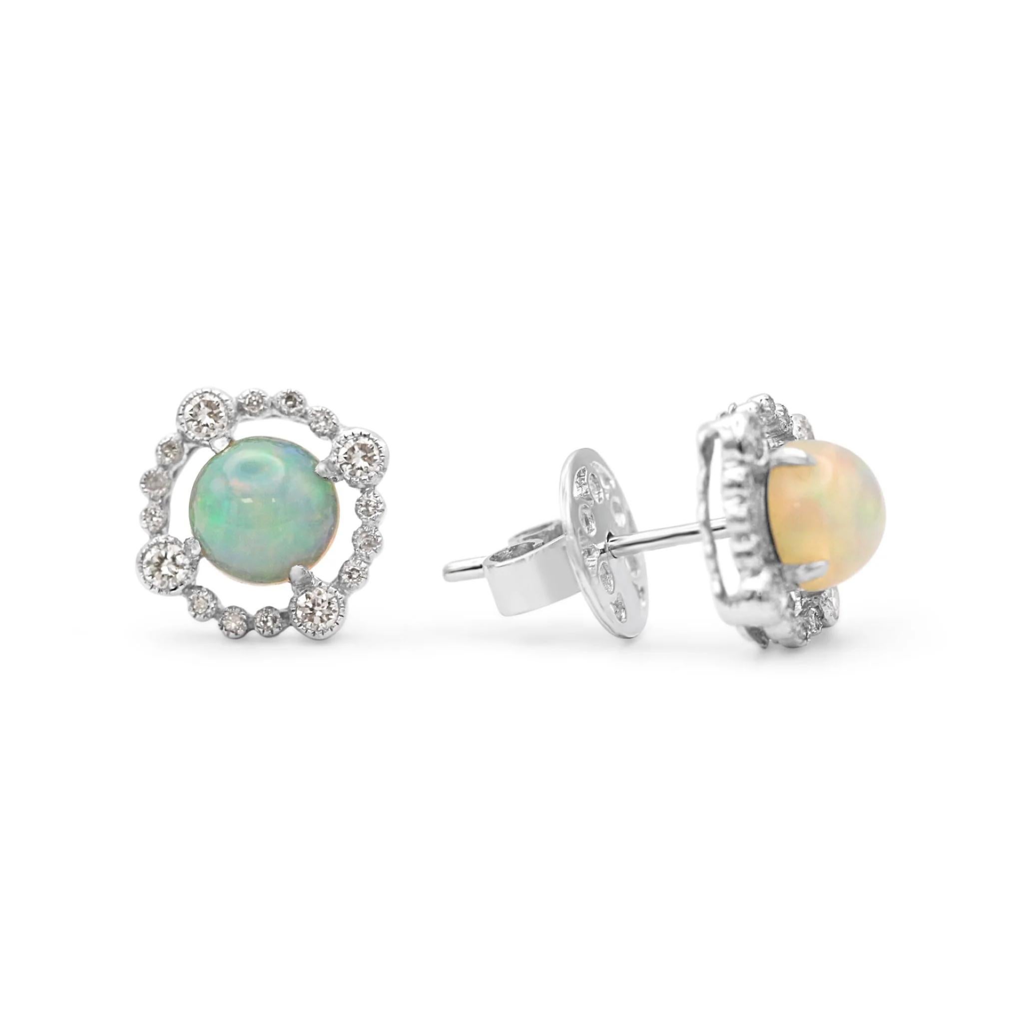 Introducing these brand new 18ct White Gold Diamond and Opal Cluster Stud Earrings, the perfect accessory for any special occasion.  Crafted from high-quality 18ct White Gold, these unworn stud earrings feature an intricate cluster of Round