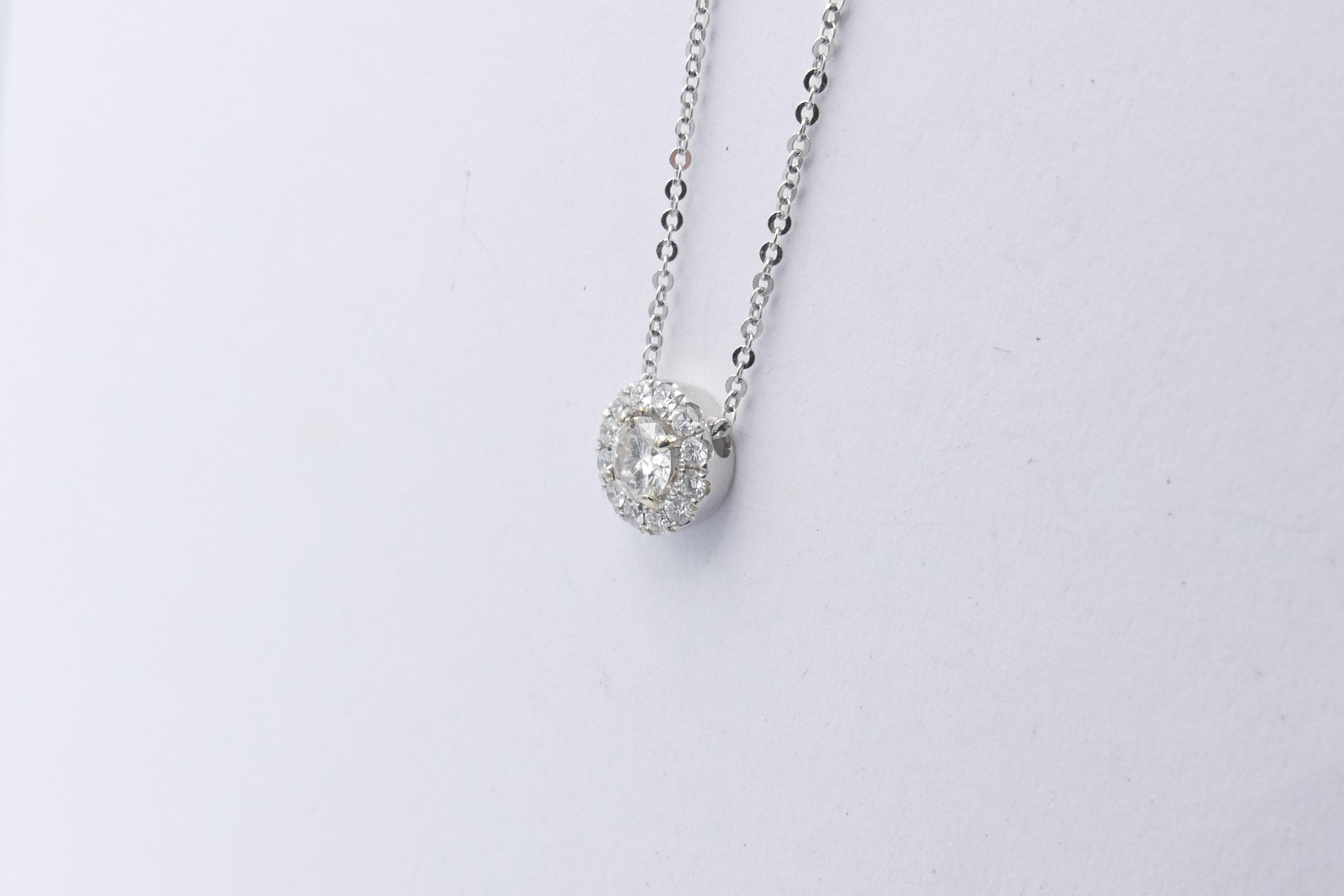 This is such a pretty & wearable Necklace.
The Centrepiece is close to a 0.3 carat good Diamond, colour G & clarity SI1.
It centres 12 round brilliant cut Diamonds, micro claw set , colour G/H, clarity SI1-SI2
The Pendant is a slider Pendant
