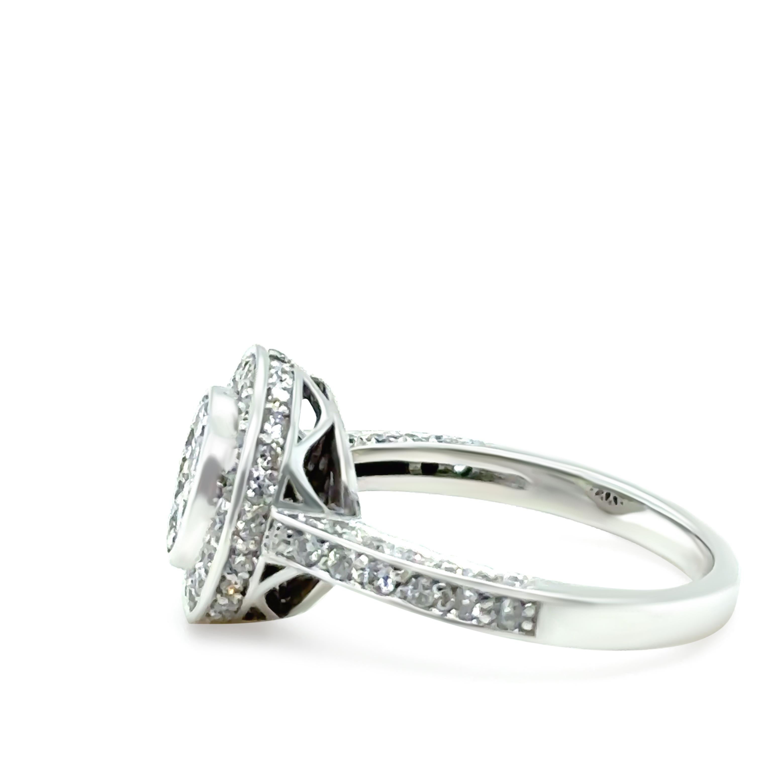 This stunning 18ct white gold diamond ring is intricately set with 86 round brilliant-cut diamonds, totaling 1.00ct. The diamonds are graded G colour and VS-SI clarity, offering exceptional brilliance and a refined elegance. Weighing 5.4 grams, Ring