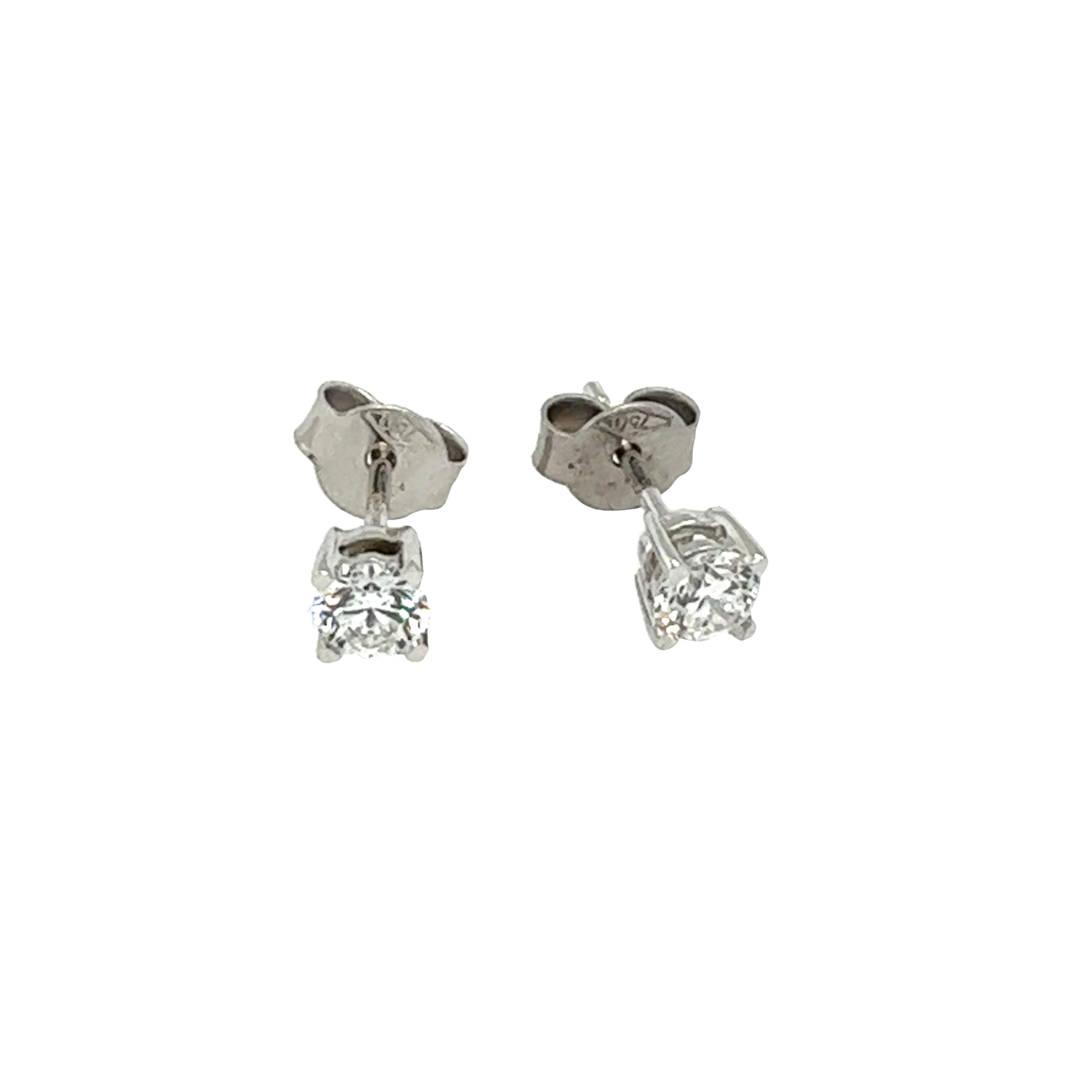 These stunning diamond earrings are the perfect pair to add to your collection. 
They are set in 18ct white gold. The pair is set with 2 round brilliant cut diamonds, 
Total Diamond Weight: 0.60ct 
Diamond Colour: D
Diamond Clarity: VSI1
Total 