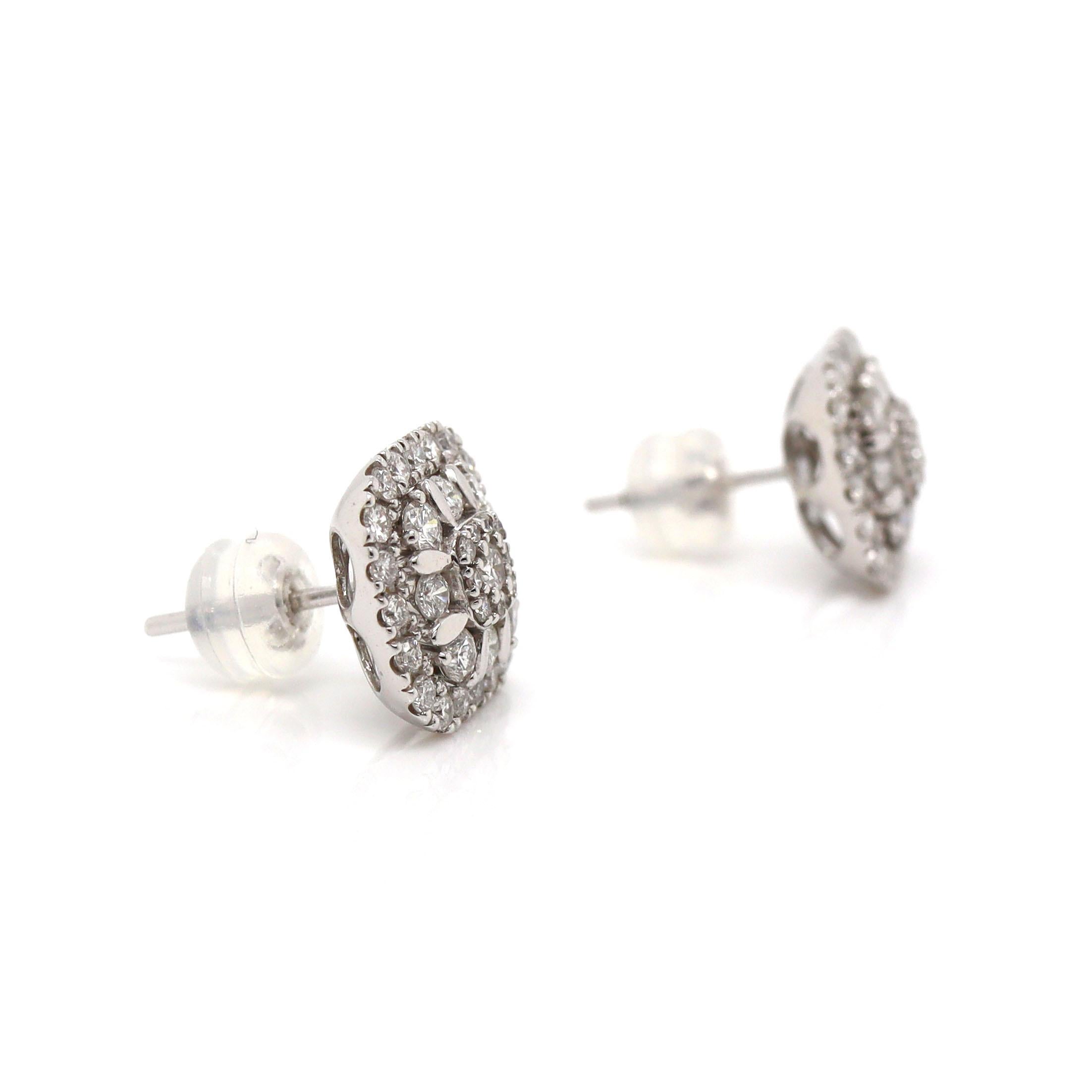 18CT White Gold Diamond Cluster Earrings

Crafted in timeless 18ct white gold, these earrings are set with bright round brilliant cut diamonds and feature post backs with rubber clasp closures.

Diamond Weight: 1.00ct
Diamond grade: Color G-H,