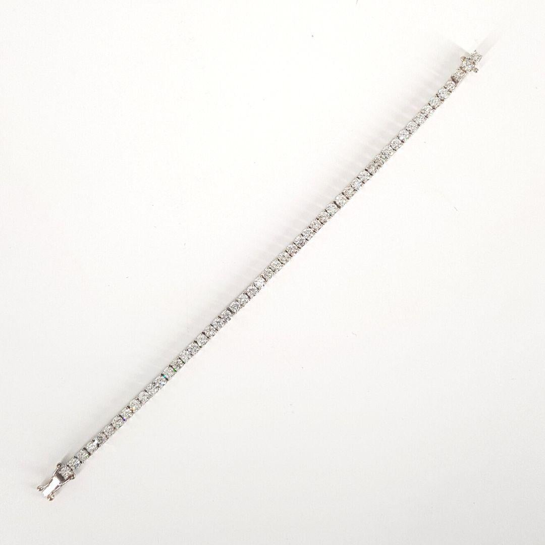 Unique bracelet
Item Attributes
Weight:			14.4 gram
Metal Colour:		White
Metal:			18ct
Stone Attributes
Number of stones:	51 x Diamonds
Carat Weight:		0.11ct each (total 5.61ct)
Cut:			Round Brilliant Cut
Colour:			GH
Clarity:			VSSI
Length:        
