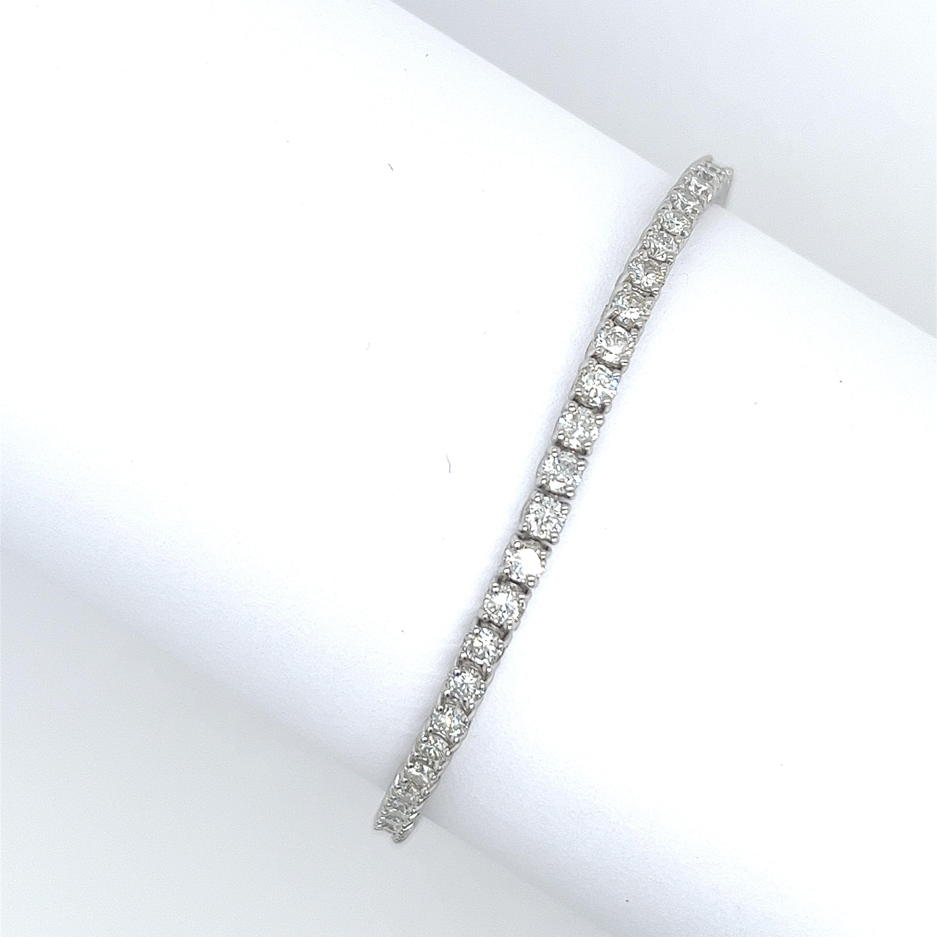A beautiful diamond tennis bracelet in 18ct white gold, 

features a total diamond weight of 4.50ct natural round brilliant cut diamonds VS1 clarity H colour.

This is a fantastic piece of jewellery that will last a lifetime 

and can be worn