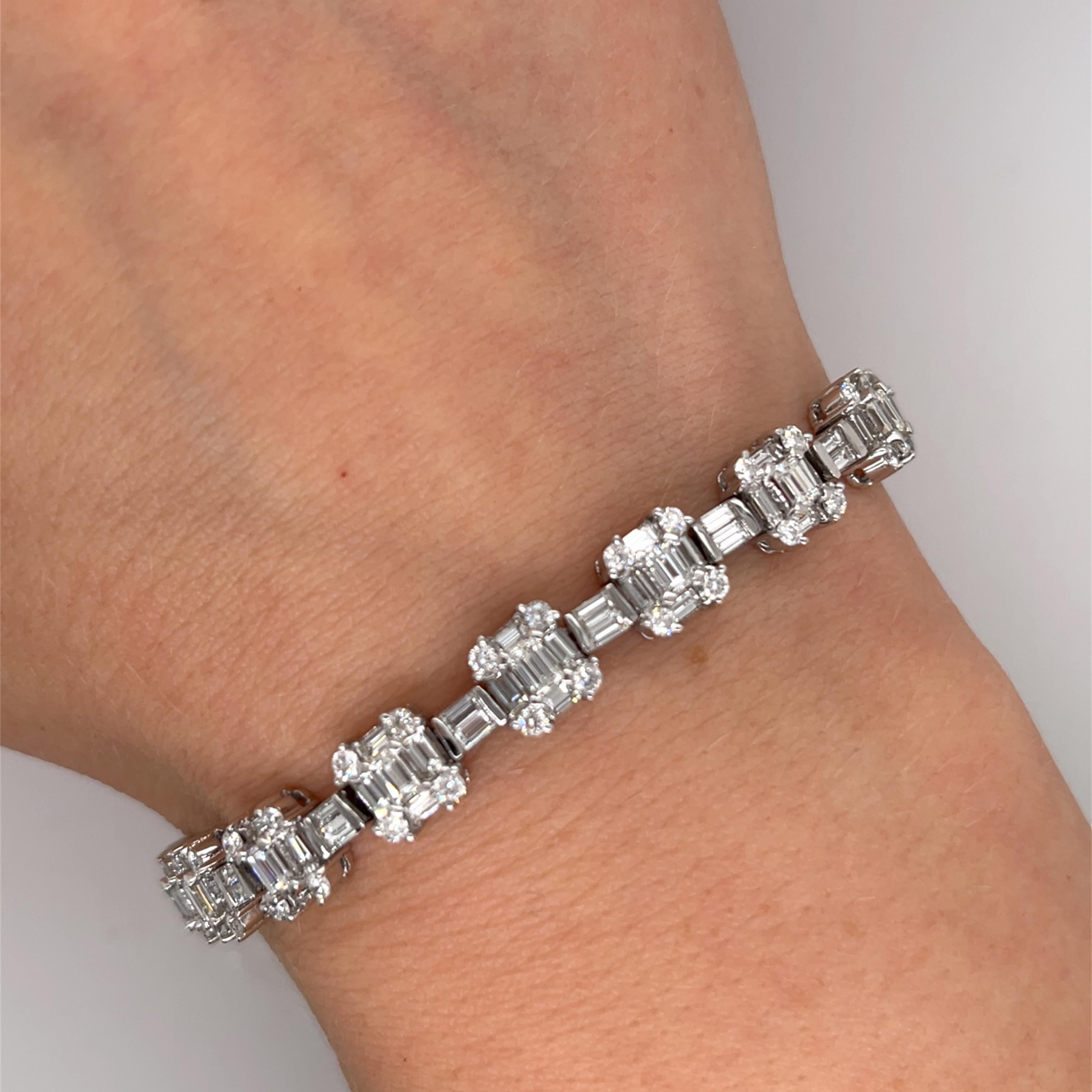 An 18ct white gold diamond tennis bracelet set with 6.0ct G-H/VS2 natural baguette and SI clarity round diamonds would be an elegant and timeless choice, perfect for any special occasion. 

Total weight: 21.20g
Total Diamond Weight: 6.0ct
Diamond