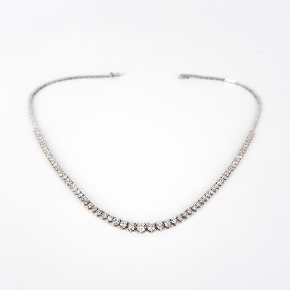 This Diamond Tennis Necklace is made in 18ct White Gold featuring 69 RBC Diamonds weighing a total carat weight of 5.63 carat. Diamonds are GH in Colour and Si in Clarity. This Necklace weighs 15.38 grams and is 43cm in length. Clasp: Tongue in box
