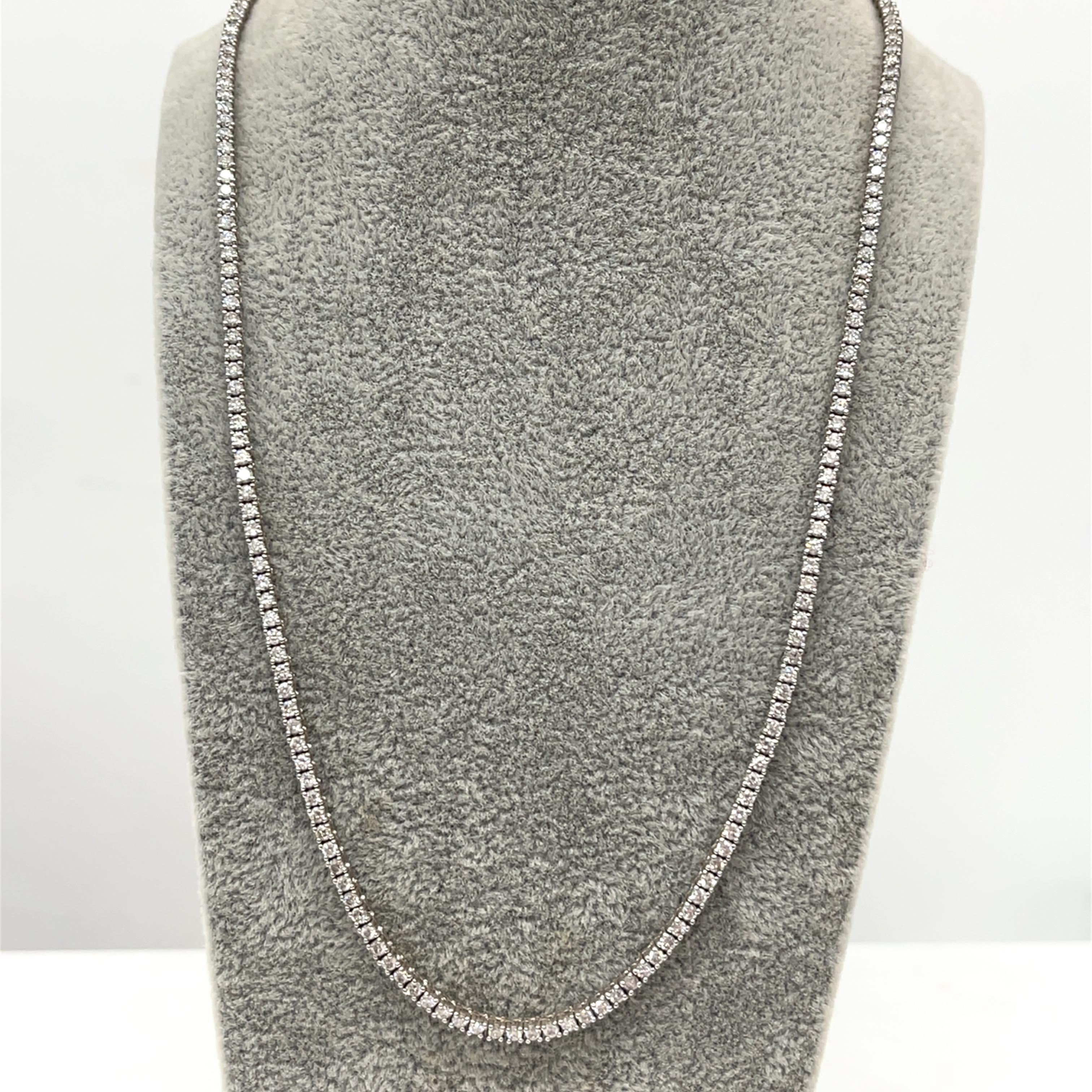 Elevate your jewellery collection with this exquisite 18ct White Gold Diamond Tennis Necklace, featuring 4.30 carats of sparkling H/SI1 natural diamonds. 
This luxurious piece combines timeless elegance with modern sophistication, making it the
