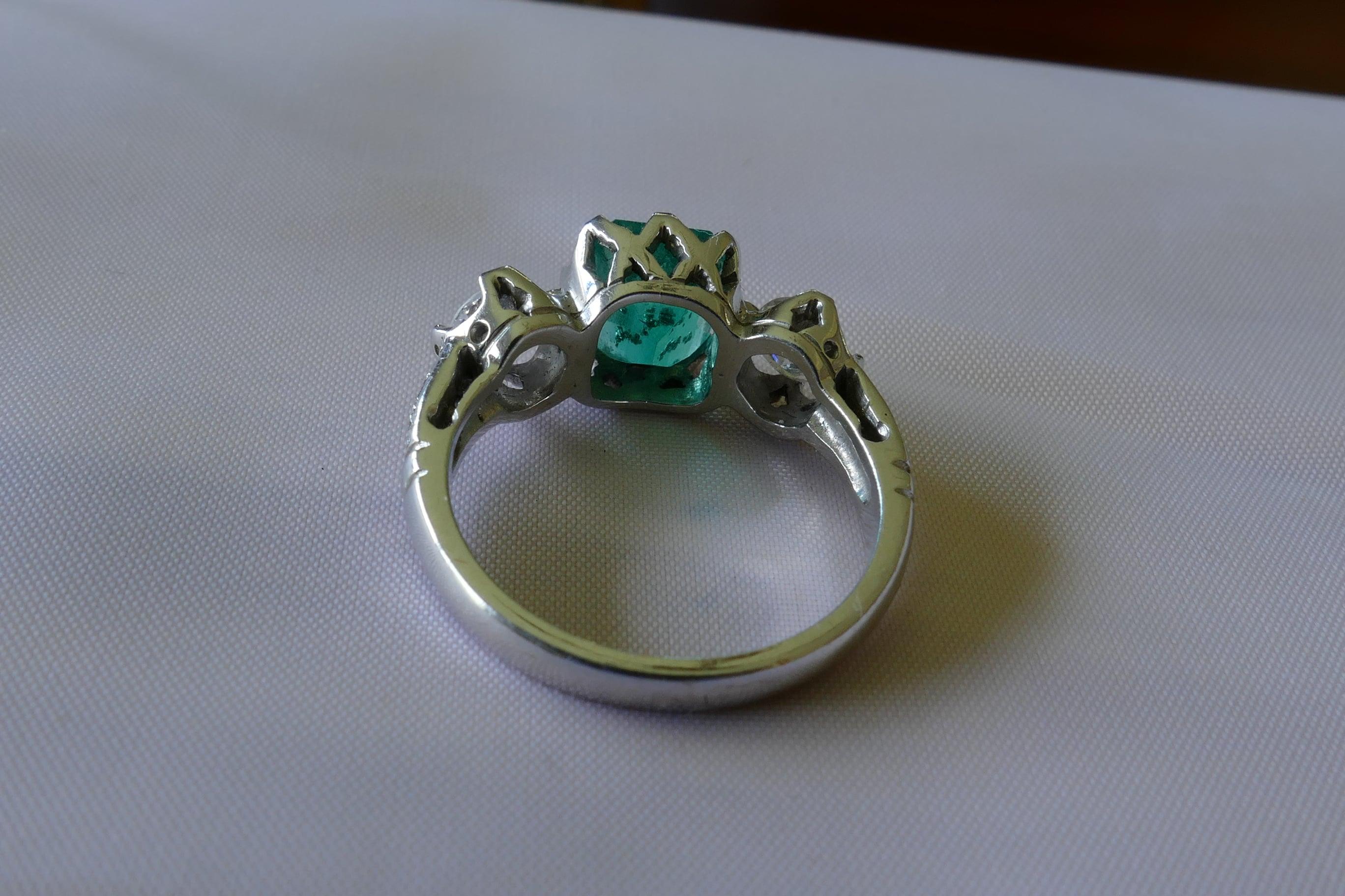 emerald and diamond 3 stone ring