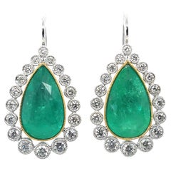 18CT White Gold Emerald and Diamond Earrings