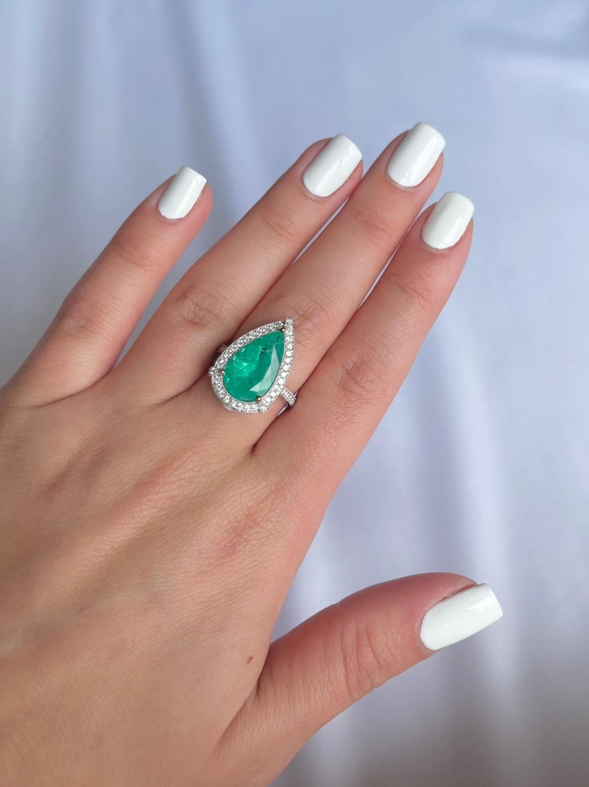 Pear Cut 18ct White Gold Emerald and Diamond Ring For Sale