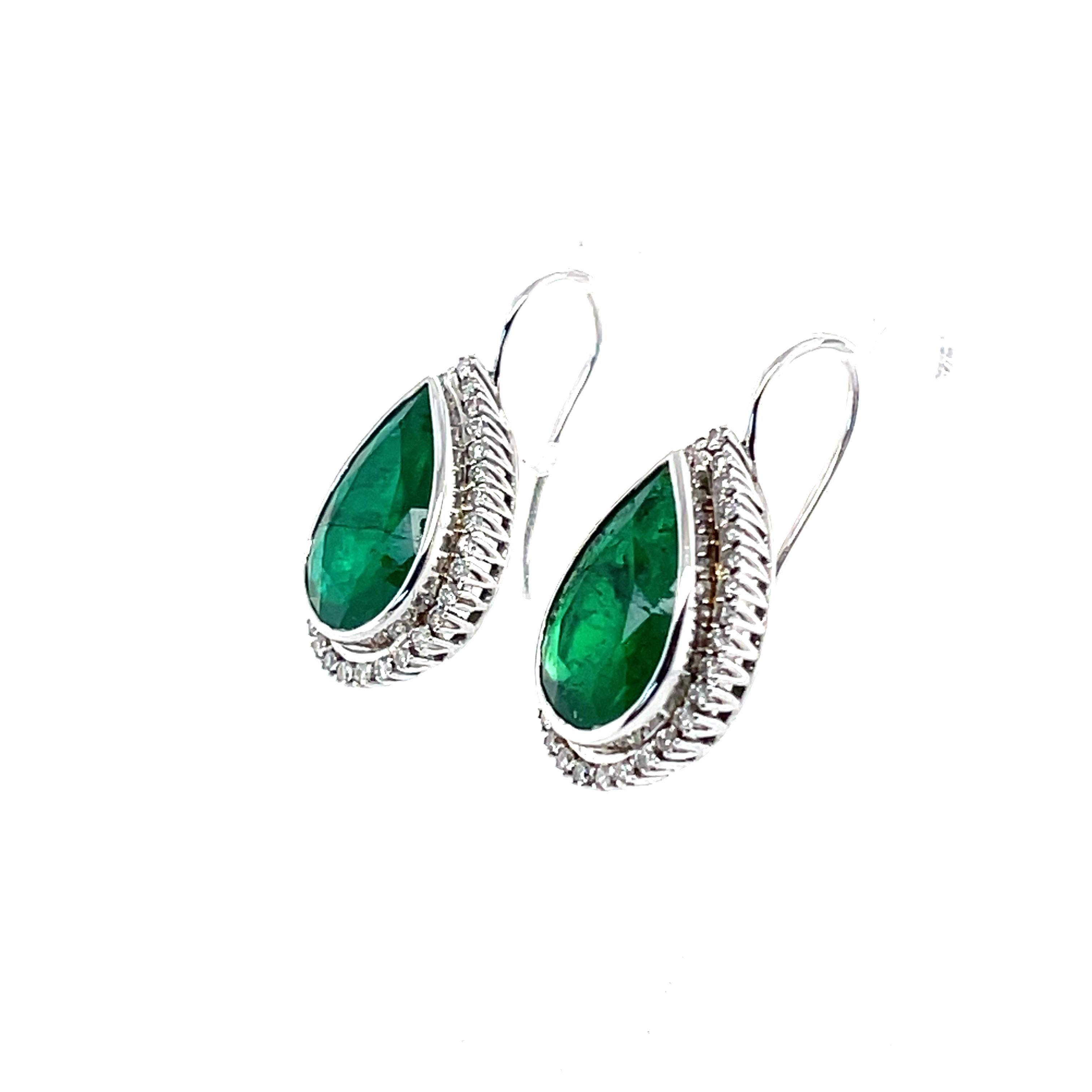 Teardrop shaped natural emeralds, complemented by a stunning range of natural round brilliant cut diamonds, complemented by a polished finish design.

Emerald Weight: 6.56ct
Emerald Colour/Grade: Medium, Strong, Green. 
Dimensions: 13.45mm(L) x