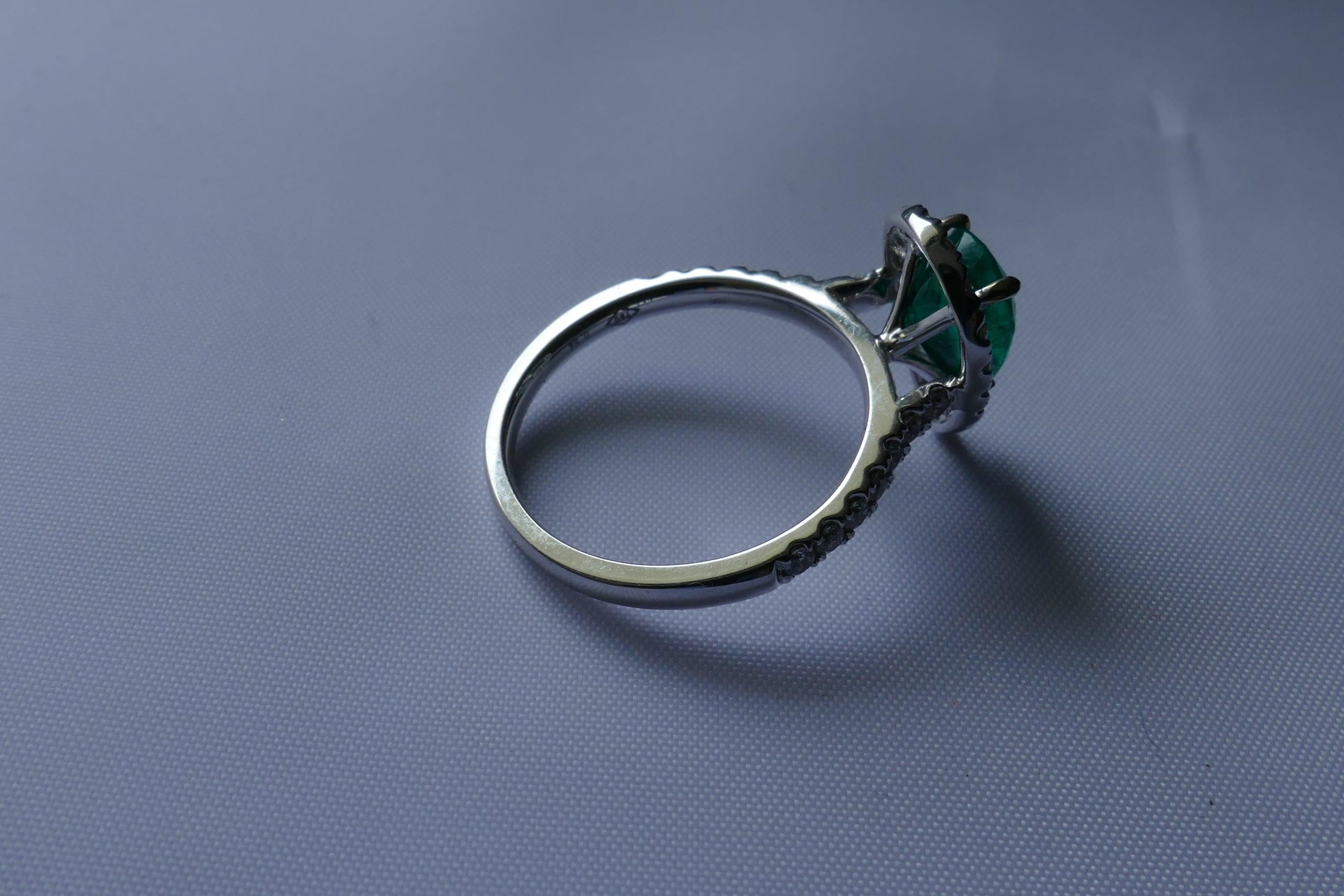 Modern 18 Carat White Gold Emerald and Diamond Pear Cut Ring