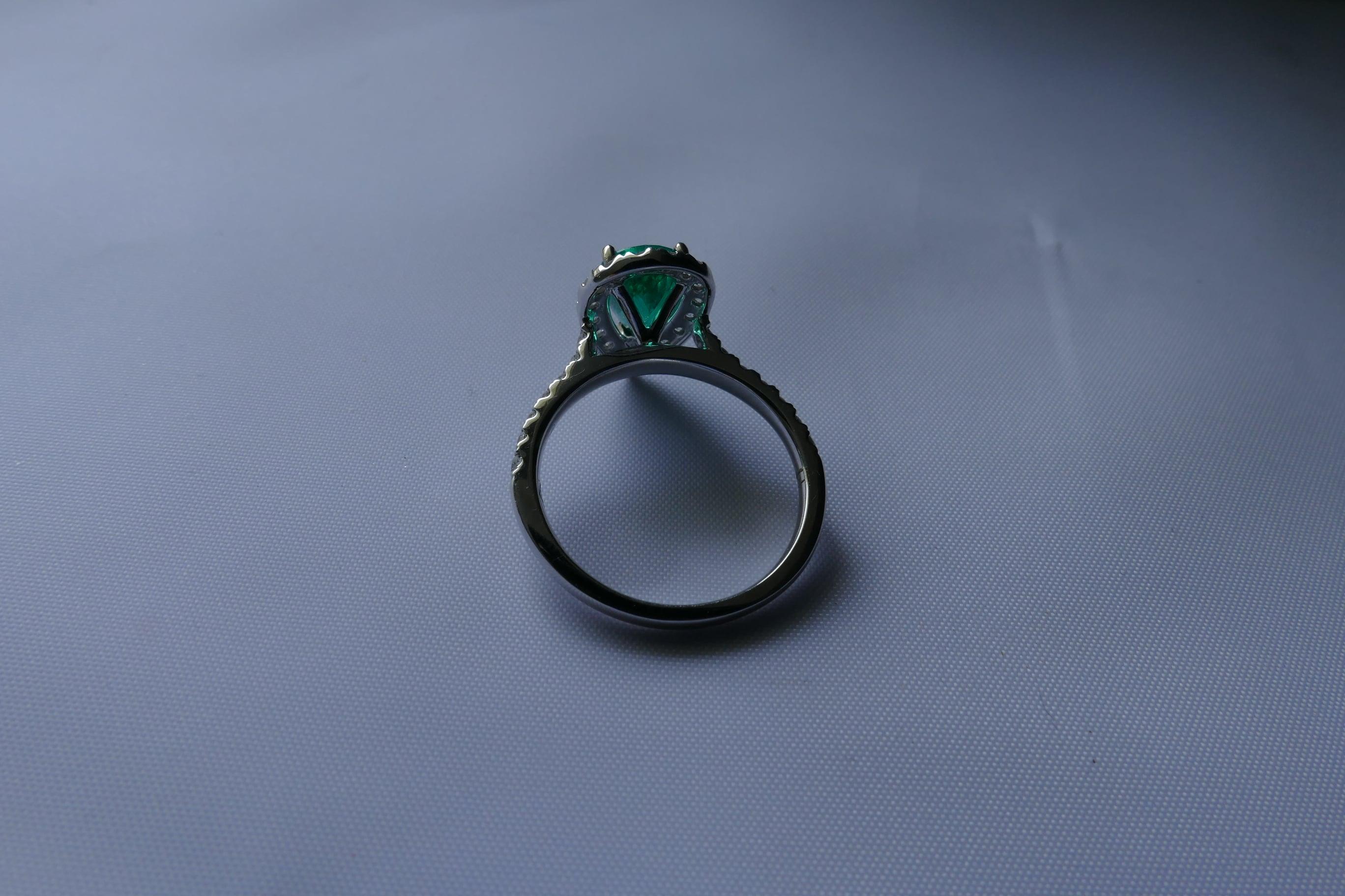 Emerald Cut 18 Carat White Gold Emerald and Diamond Pear Cut Ring