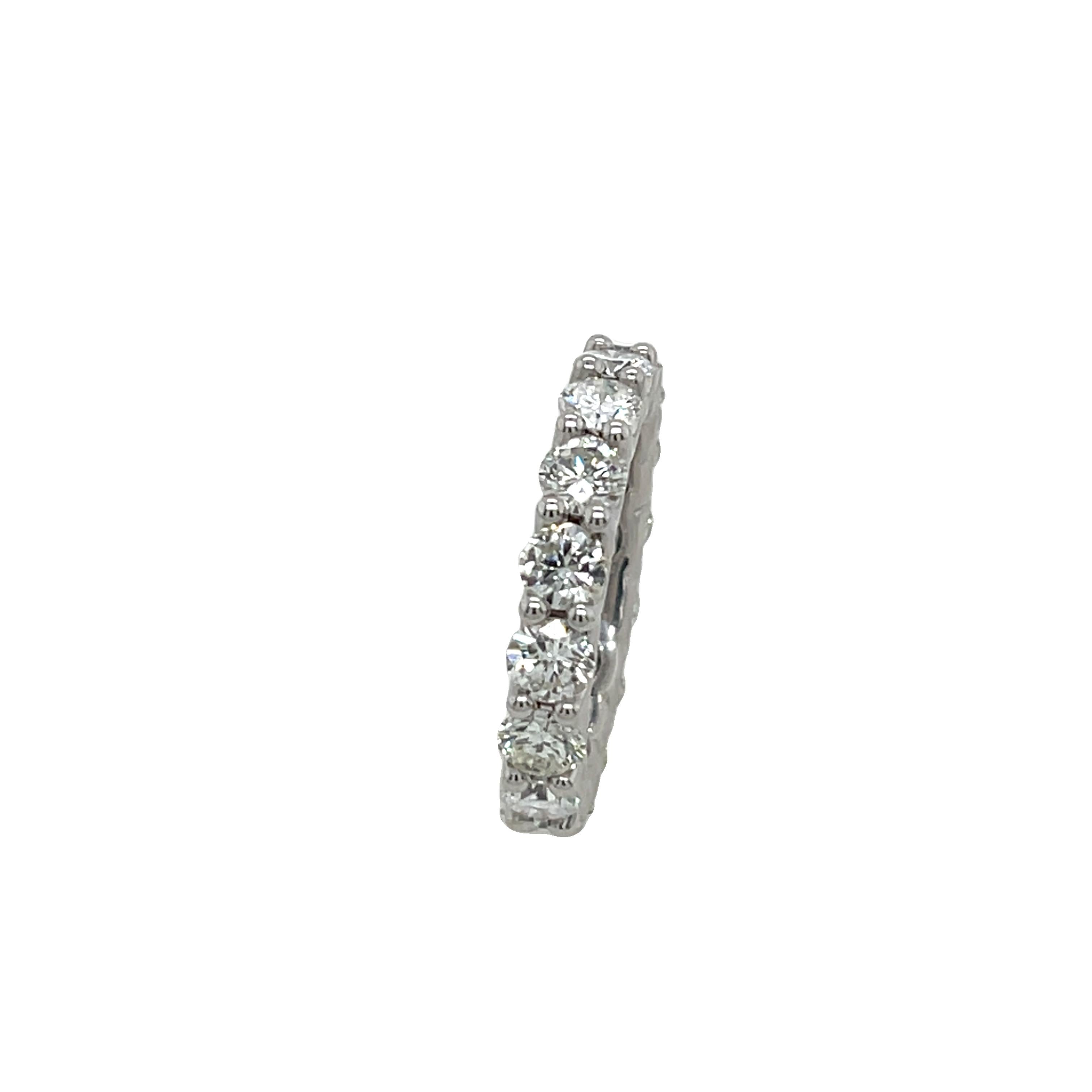 An elegant and timeless piece, this full eternity ring 
is crafted in luxurious 18ct white gold, fully set with 4.27 carats of natural round brilliant cut diamonds. 
The diamonds are beautifully matched for sparkle and brilliance, creating a