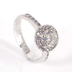 18 Carat White Gold Halo Diamond Ring