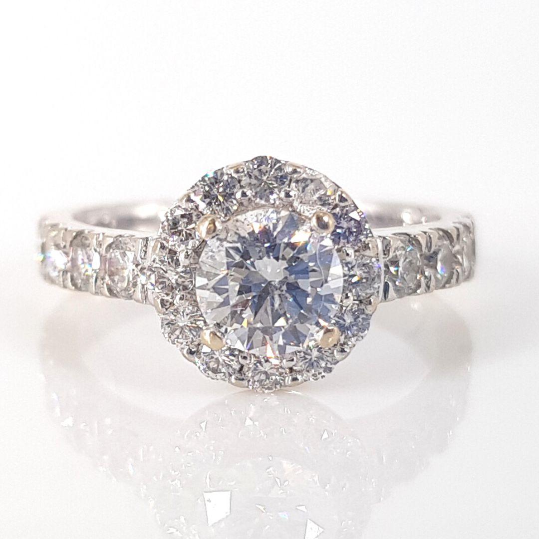 Women's 18 Carat White Gold Halo Diamond Ring For Sale