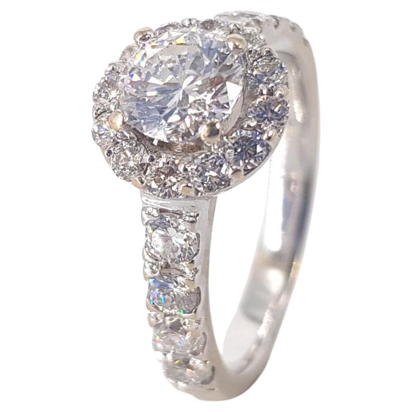 18 Carat White Gold Halo Diamond Ring For Sale