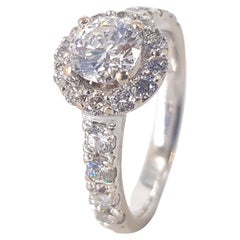 18 Carat White Gold Halo Diamond Ring