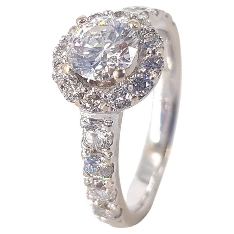 18ct White Gold Halo Style Diamond Ring - 0.50ct Diamonds main image 0