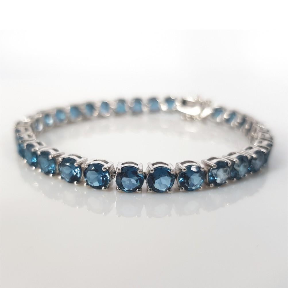 18 Karat Weißgold Londoner Blautopas-Tennisarmband Damen