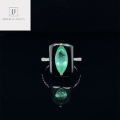 18ct White Gold Marquise Colombian Emerald, Onyx & Diamond Ring