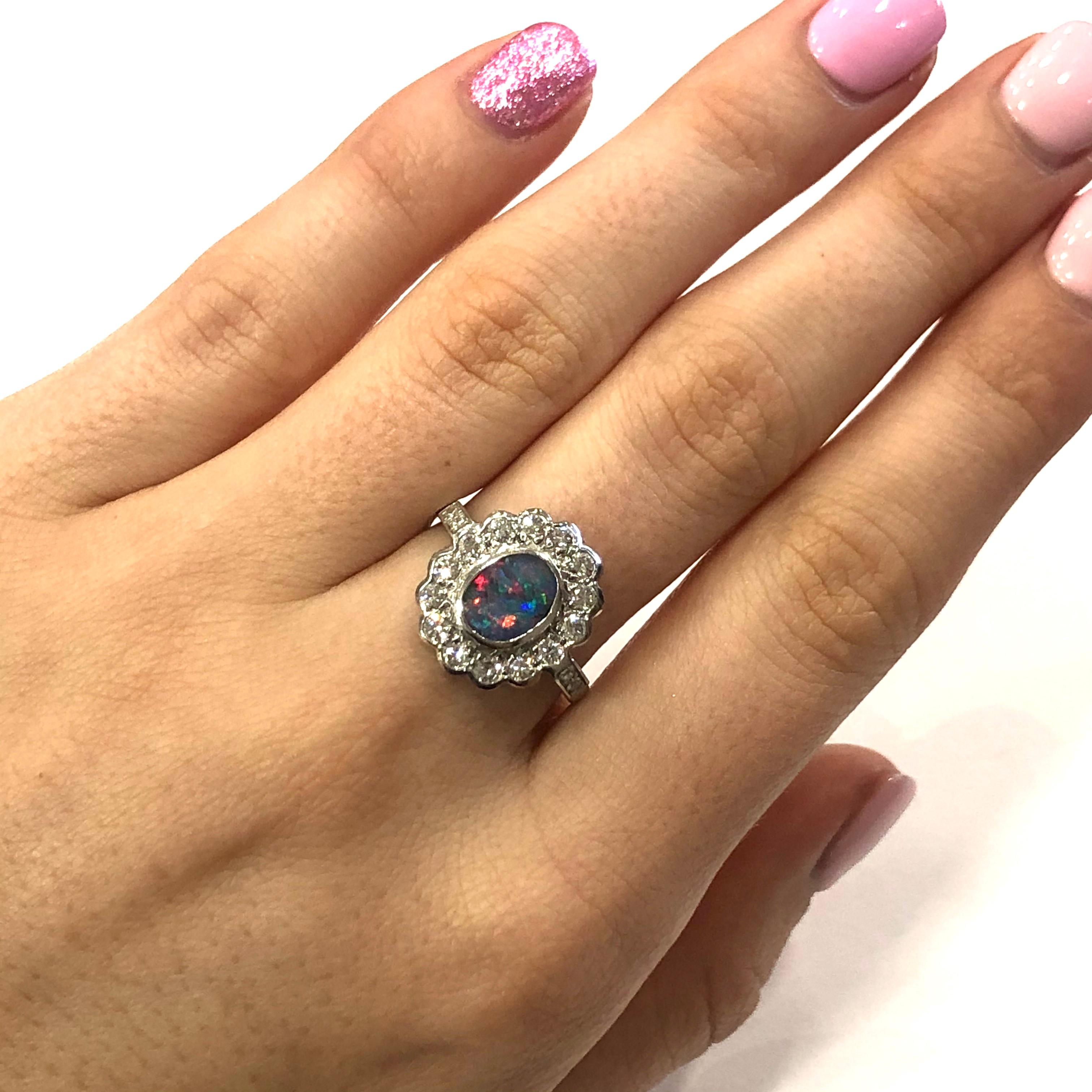 Oval Cut 18 Carat White Gold Opal and Diamond Cluster Ring For Sale