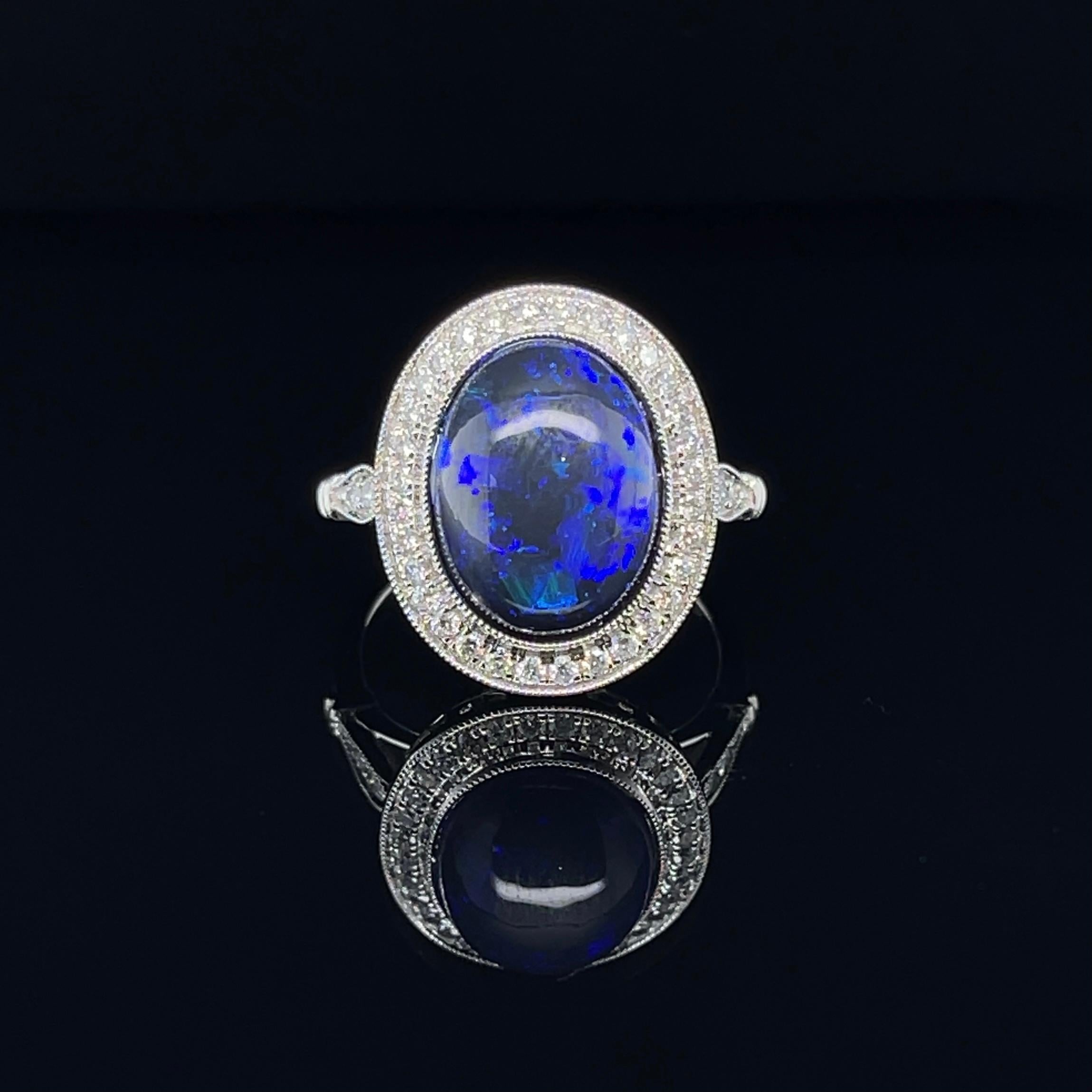 For Sale:  18ct White Gold Opal and Diamond Ring