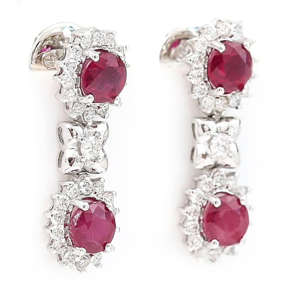 Contemporary 18ct White Gold Oval Cut Ruby and Brilliant Cut Diamond Earrings For Sale