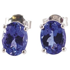 Clous d'oreilles en or blanc 18 carats avec tanzanite ovale