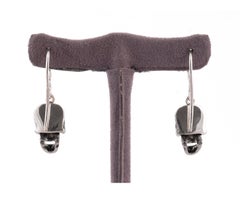 18ct White Gold Pave Set Black Diamond Skull Earrings with Rubies Eyes