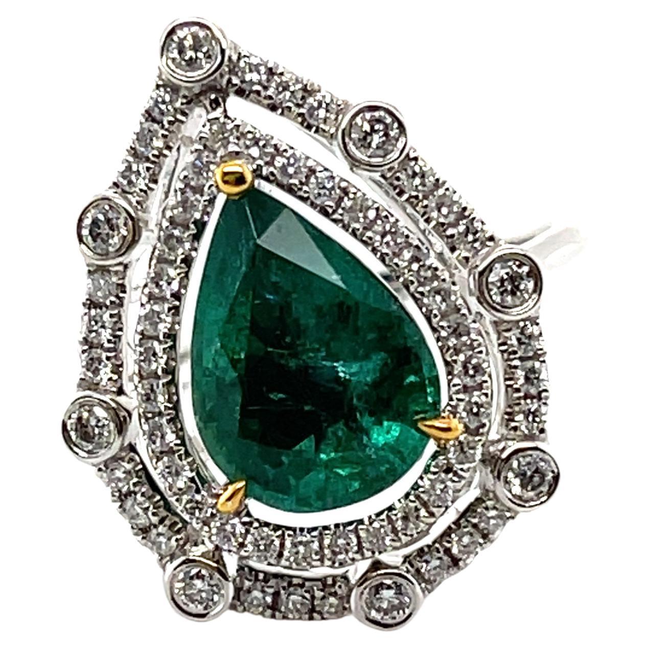For Sale:  18ct White Gold Pear Emerald and Diamond Ring