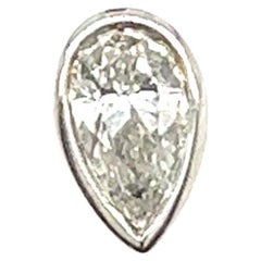Orecchino singolo con diamante a forma di pera in oro bianco 18 ct.