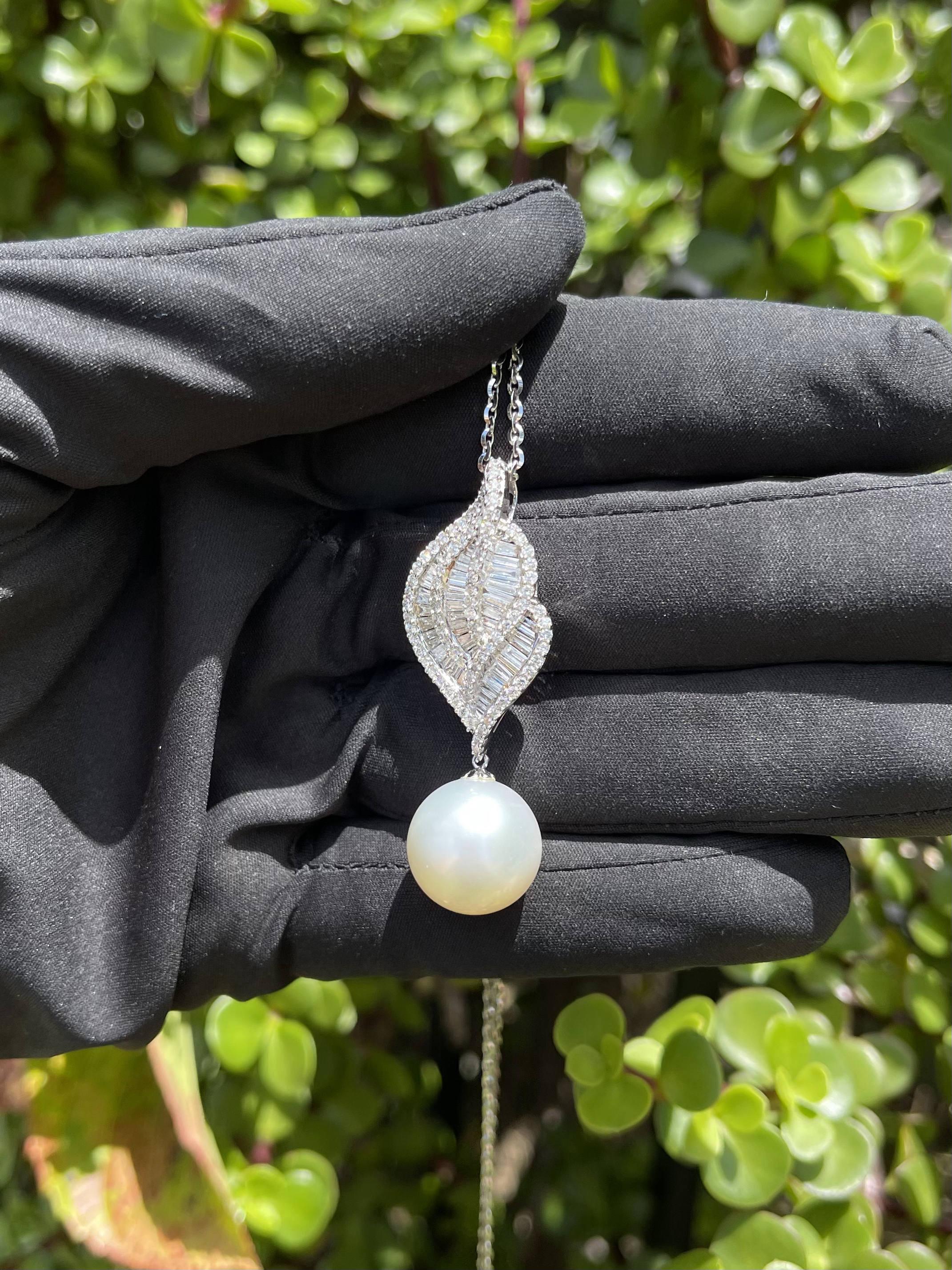South sea pearl and diamonds, crafted with eighteen karat white gold, featuring a stunning selection of fifty-seven channel set tapered baguette cut diamonds and eighty-three claw set round brilliant cut diamonds, complimented by a beautifully
