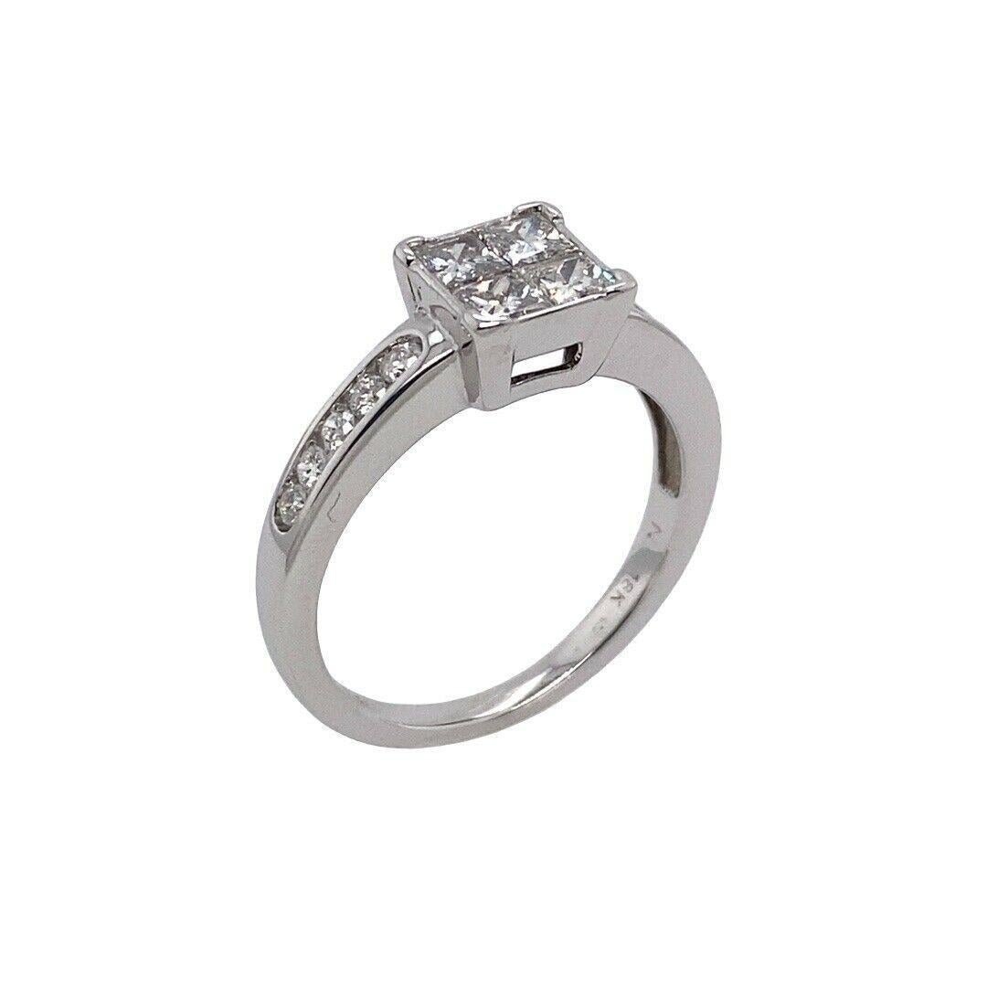 18ct White Gold Princess Cut Diamond Solitaire Ring, Set With 0.75ct

This 18ct White Gold princess cut diamond solitaire ring, set with 0.75ct of Diamonds set with 4 princess cut & 10 round brilliant cut Diamonds is an engagement ring that has a