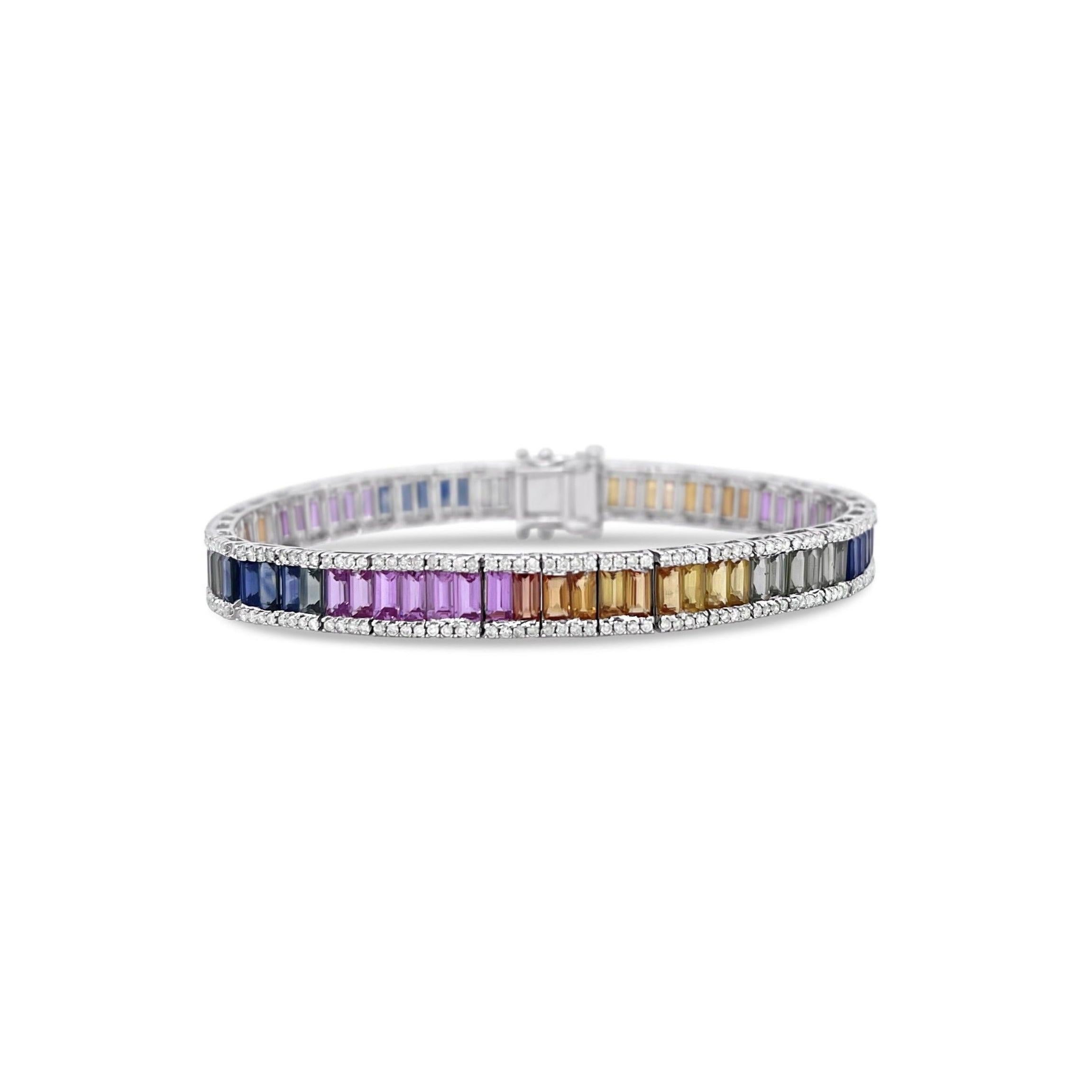 ﻿Fancy Sapphires, crafted with eighteen karat white gold, featuring a stunning set of round brilliant cut diamonds and channel set, multi coloured, fancy sapphires, complemented by a beautiful polished finish design.

 Sapphire Weight: