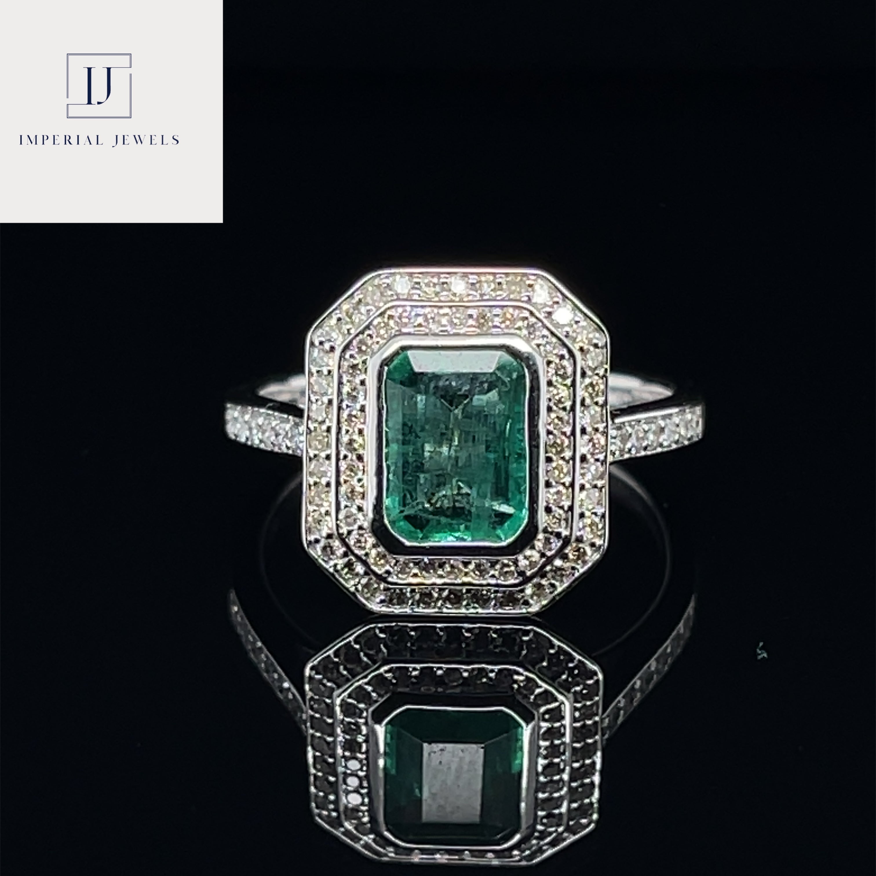 For Sale:  18ct White Gold Ring with 1.39ct Emerald and Diamond Ring
