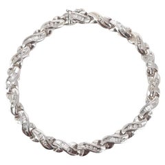 Bracelet en or blanc 18 carats avec diamants taille ronde brillants et baguettes