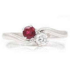18ct White Gold Ruby and Diamond Two Stone Toi Et Moi Crossover Ring