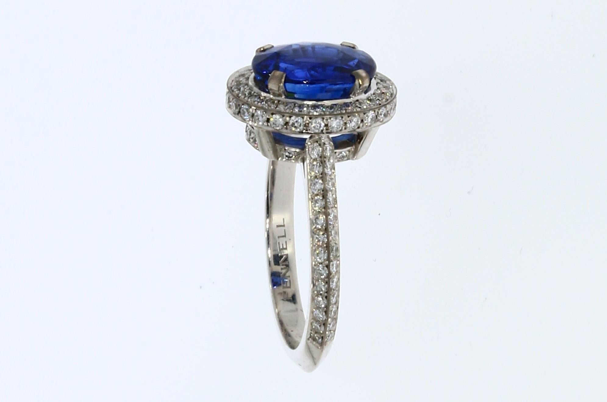 Contemporary 18 Carat White Gold, Sapphire and Diamond Halo Ring For Sale