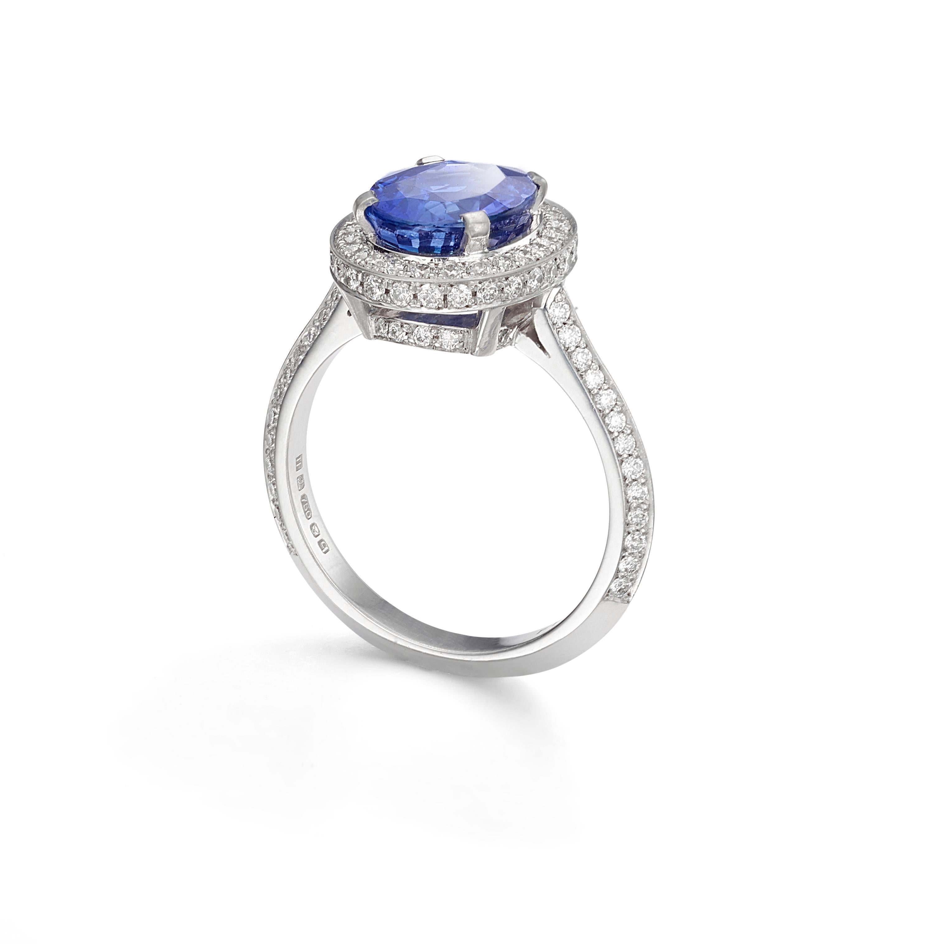 Oval Cut 18 Carat White Gold, Sapphire and Diamond Halo Ring For Sale