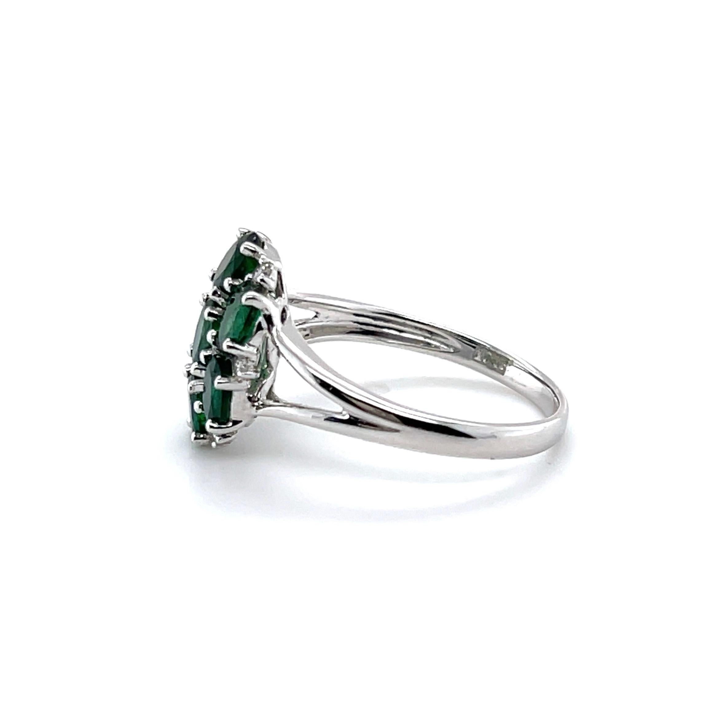 For Sale:  18ct White Gold Seven Stone Emerald and Diamond Ring 2