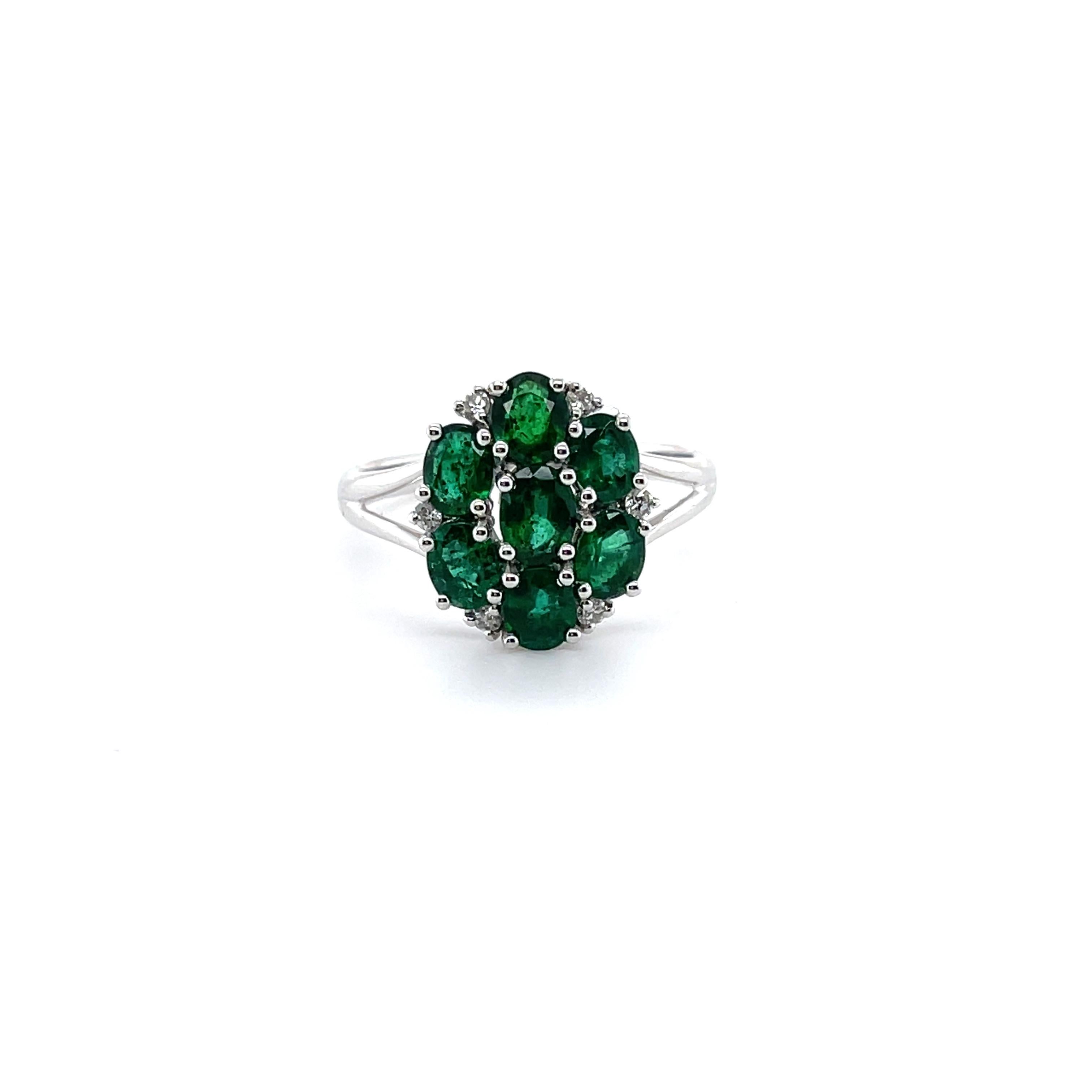 For Sale:  18ct White Gold Seven Stone Emerald and Diamond Ring